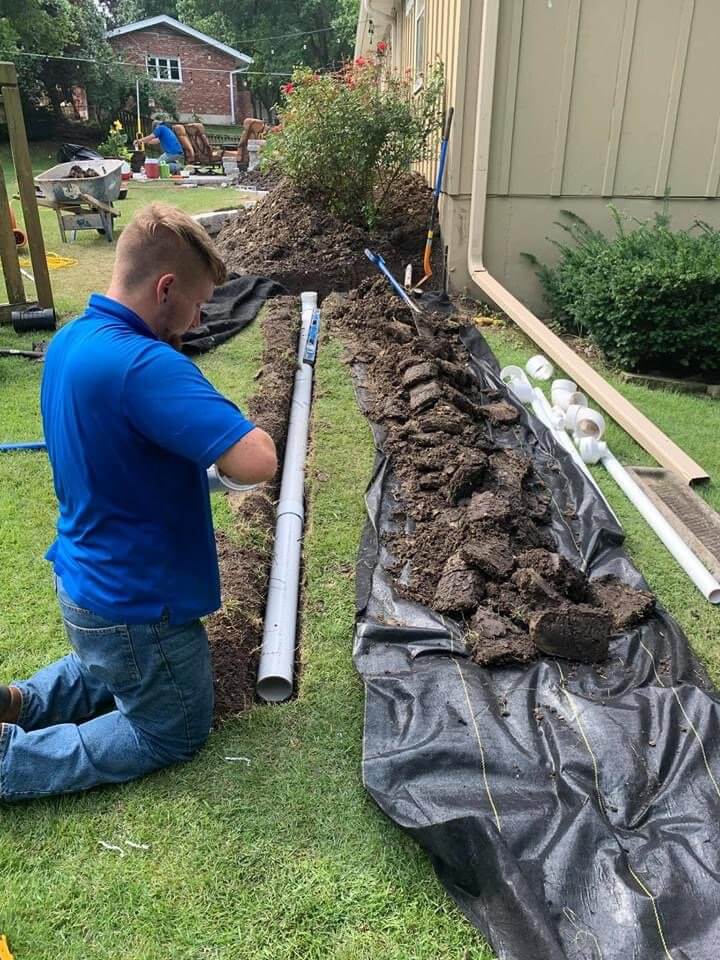 High Prairie Member Repairing A Water Kansas CityPipe